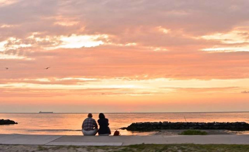 Watch the sun set over the Chesapeake Bay. Bottle of wine optional. Courtesy of Visit Eastern Shore, Virginia